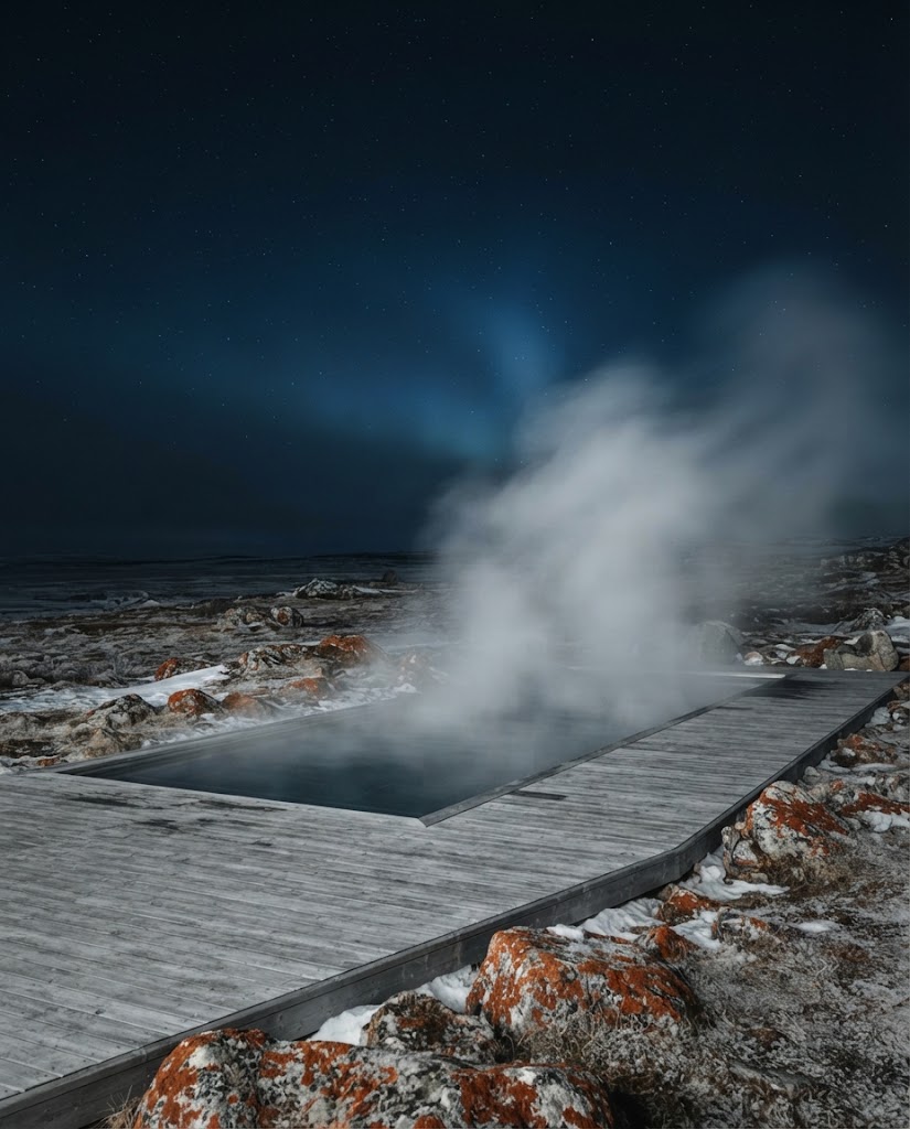 Artist's impression of the planned heated outdoor pool, steam rising, with tundra all around
